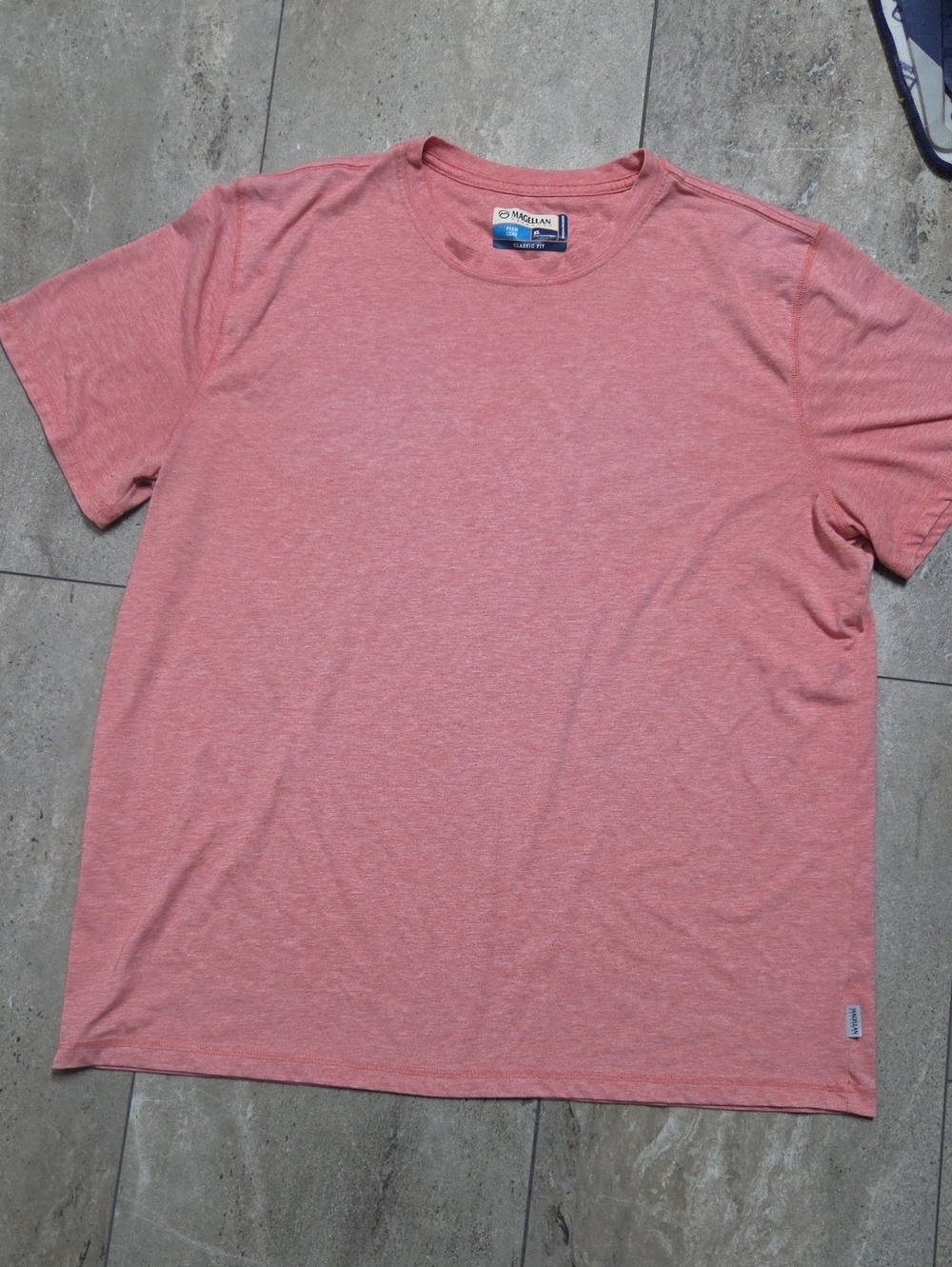 - Magellan Outdoors Men’s Coral Heather Short Sleeve Tee